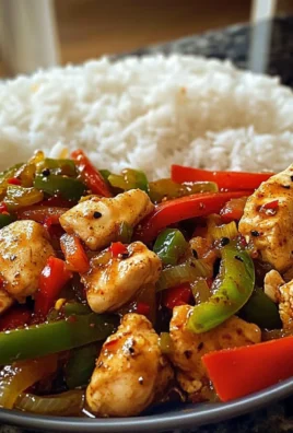 Spicy Garlic Pepper Chicken Stir-Fry with Steamed Rice